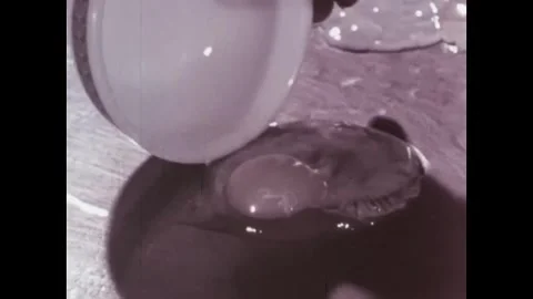 USA - 1966 - A chef demonstrates different methods of frying eggs. Stock Footage 340582784
