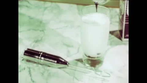 USA - 1966 - The difference between what makes a battery rechargeable or not is Stockbeeldmateriaal 264667993