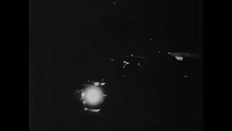 USA - 1966 - Drunk high school dropouts mockingly cheer their old school as they Stock Footage 323263600