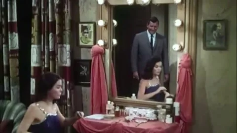 USA - 1966 - In this sci-fi spy thriller, a man enters a woman's dressing room. Stock-Footage 325206786