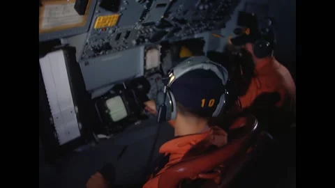 USA - 1966 - Several men work diligently to operate and control machines at the Stock Footage 296692430