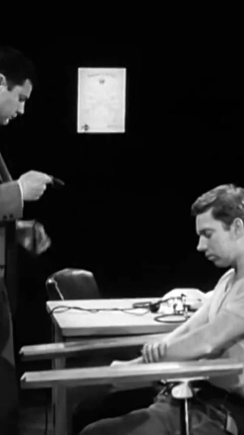USA - 1966 - The suspect in a robbery still attempts to deny his crimes to an Stock Footage 338395990