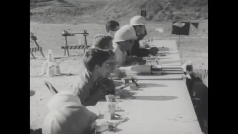 USA - 1968 - Children launch a model rocket from a bucket of water, captured in Stock Footage 340649334