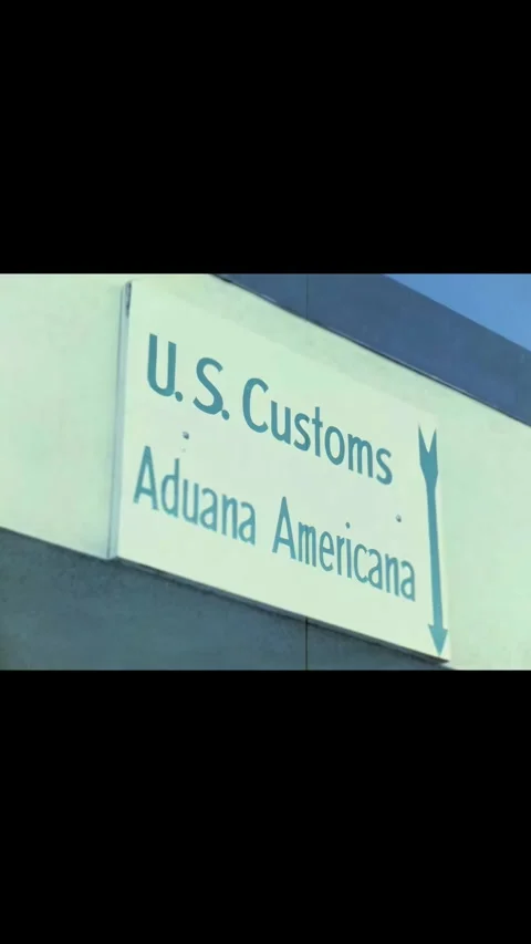 USA - 1968 - US Customs Service agents thoroughly search cars at the US-Mexican Stock Footage 339829697