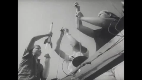 USA - 1968 - Young members of a model rocket club set up a tracking station and Stock Footage 340649397