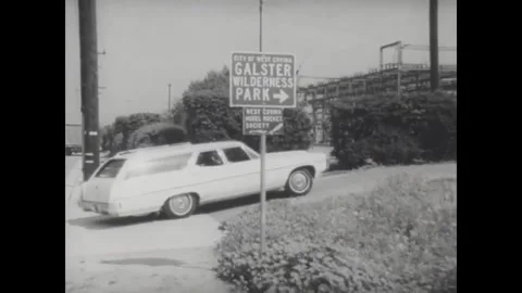 USA - 1968 - Young members of a model rocket club arrive at their launch site Stock Footage 340649423