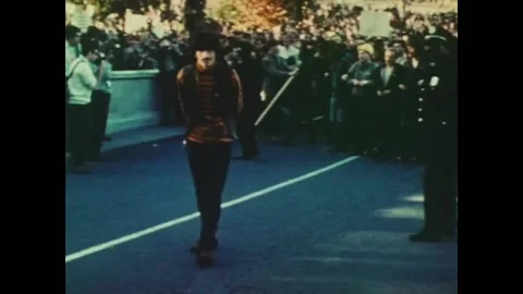USA - 1969 - Cops try to quell an anti-war demonstration as a narrator rails Stock Footage 259550463