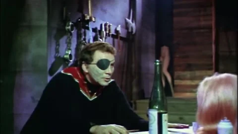 USA - 1969 - In this horror, a man with an eye patch paints a wax figure. He Video stock 325213893