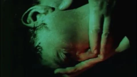 USA - 1969 - In this horror, a man is lit on fire in a dream then hugs a clay Stock Footage 325201686
