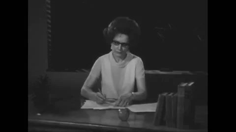 USA - 1969 - A teacher is skeptical of a computer's ability to verify tax Stock Footage 325203423