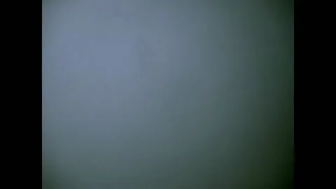 USA - 1970 - Television knobs are turned and the screen is looked at. Video stock 327745463