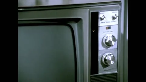 USA - 1970 - The TV knobs are turned and the screen is panned too. 스톡 동영상 327741747