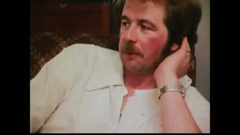 USA - 1970s - Cops help a couple reach a testy solution to an immediate problem Stock Footage 264667245