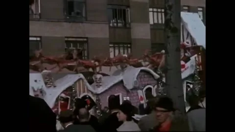 USA - 1970s - Santa rides on a float in a New York holiday parade. A holiday Stock Footage 327742614