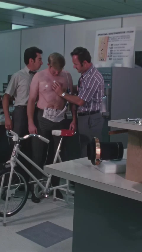 USA - 1971 - A man is fitted with operational bioinstrumentation system Stock Footage 340298995