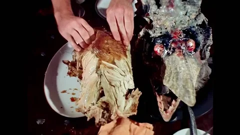 USA - 1972 - In this horror sci-fi, a chicken is ripped apart by multiple Stock-Footage 325215144