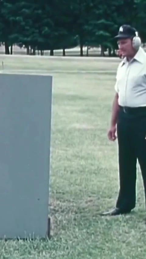 USA - 1974 - An instructor teaches basic shooting techniques, including firing a Stock Footage 338397507