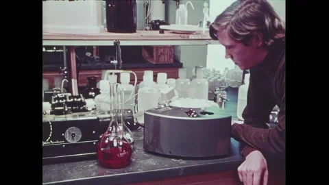 USA - 1974 - Scientists work at an atomic power plant. Different scientific Stock Footage 327737175