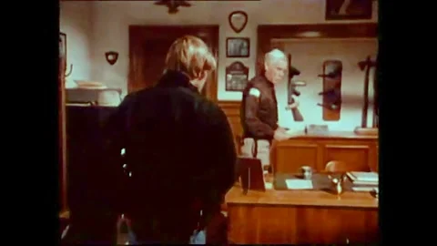 USA - 1975 - In this drama, a sheriff's son tells him he wants to go to West Stock Footage 341983399