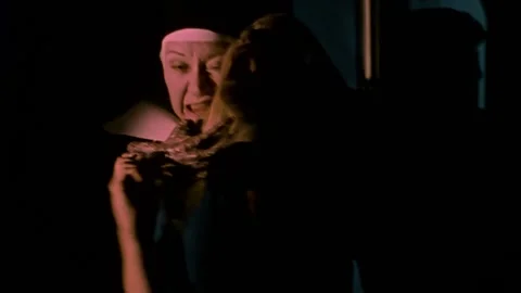 USA - 1977 - In this sci-fi horror, a man and woman sneak around a convent and Vidéo 327743095