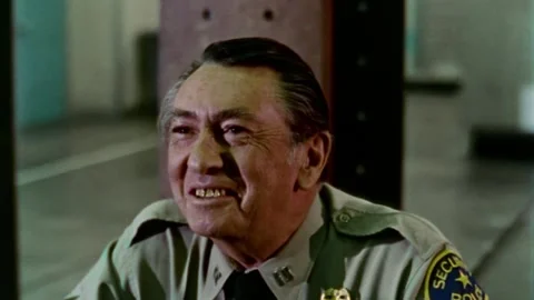 USA - 1977 - In this sci-fi horror and then speaks to a security guard in a Stock-Footage 327751510