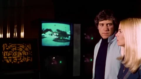 USA - 1977 - In this sci-fi horror, a man and woman decide to enter an alien Video stock 327755187