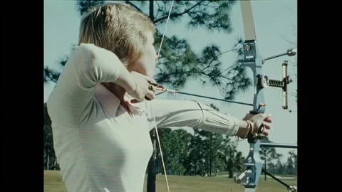 USA - 1978 - Archers demonstrate different ways they position their elbows while Stock Footage 301307420