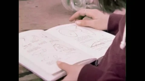 USA - 1978 - Children try using a sling to fix a marionette's broken arm, but it Video stock 261574756