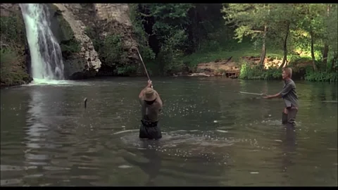 USA - 1978 - In this sci-fi movie, humanoid aliens enjoy fishing on planet Stock Footage 308174633