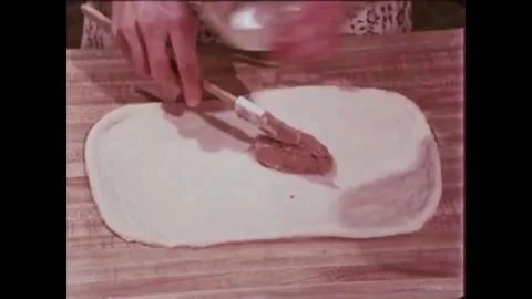 USA - 1981 - A baker demonstrates how to make cinnamon rolls. Stock Footage 261574988