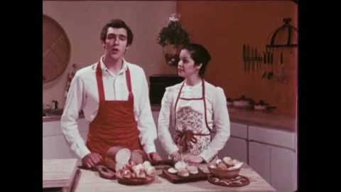 USA - 1981 - A baker plans on teaching how to make yeast bread and rolls, Stock Footage 261572275