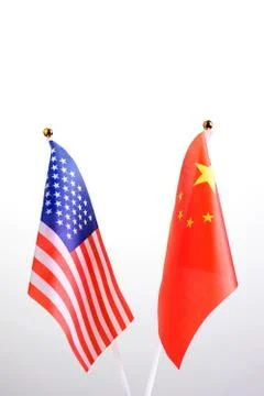 USA and PRC. Two table flags on a white background. The concept of a meeting  Stock Photos
