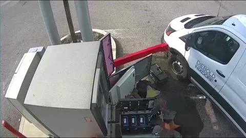 USA: Armed Robbers Attack Security Guard During First Horizon Bank ATM Repai... Stock Footage 282371622