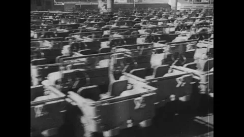 USA CIRCA - 1943: Shows finished jeeps queued at the plant Stock Footage 339215898