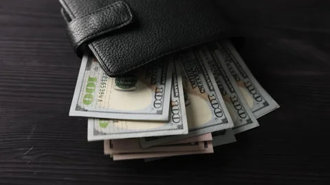 Usa Dollars In Big Leather Wallet Fluttering In The Wind Stock Footage 311453073
