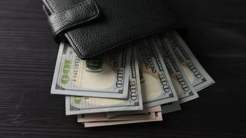 Usa Dollars In Big Leather Wallet Fluttering In The Wind Stock Footage 312467343