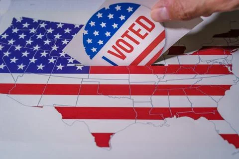 USA elections 2020, the hand of a man putting his vote in a ballot box with the Stock-Fotos