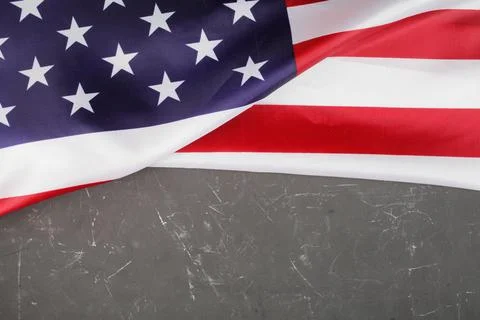 USA flag on a dark concrete background, place for your text. Stock Photos