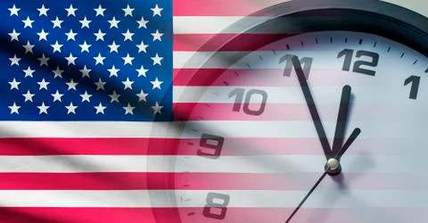 USA flag with dial of a clock Stock Photos