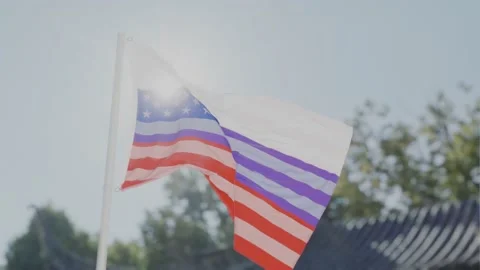 USA flag fading into Russia flag Stock Footage