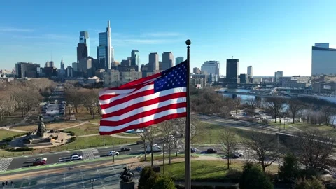 USA flag with metropolitan Philly skyline. Phila downtown center city Stock Footage 229059989