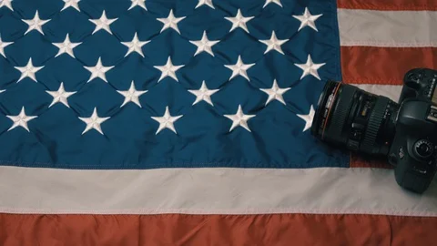 USA flag in slow motion. Camera lies on Flag Stock Footage 126496143
