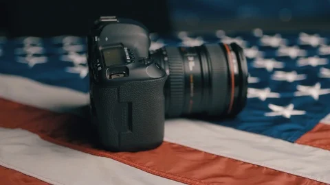 USA flag in slow motion. The camera lies on the flag. Background. Extreme Close Stock Footage 126627011