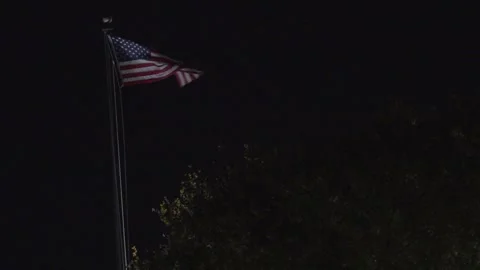 USA Flag waving at night Stock Footage 293744389