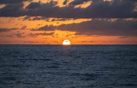 USA, Florida, Boca Raton, Sunrise over sea Stock Photos