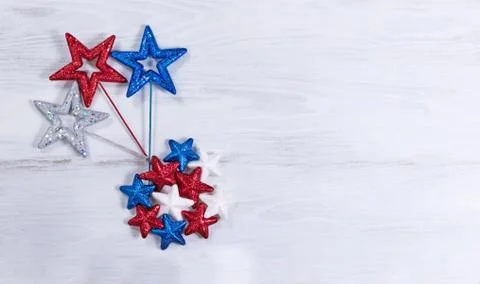 USA holiday stars in exploding pattern on white wooden boards Stock Photos