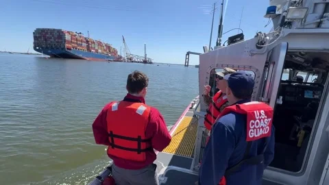 USA: Key Bridge Unified Command Incident Commanders observe progress of resp... Stock Footage 276311756