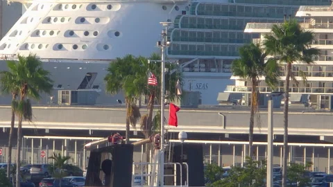 USA Map waving in front of a Large Cruise Ship Docked at Tropical Port Terminal Stock Footage 340307267