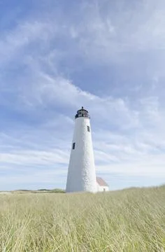 USA, Massachusetts, Cape Cod, Nantucket Island, Great Point Light against sky Stock Photos