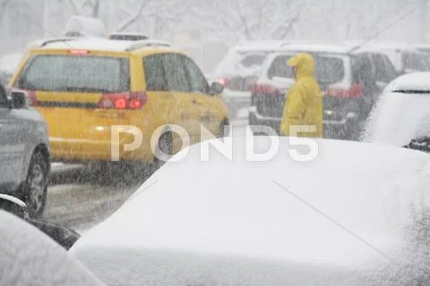 USA, New York City, city traffic in snowstorm Stock Photos